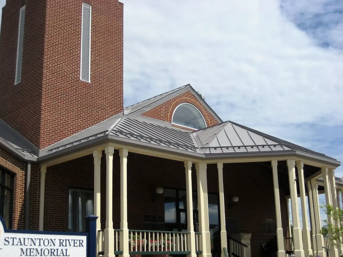 Skilled roofing craftsmen working on a residential roof in Scarboro